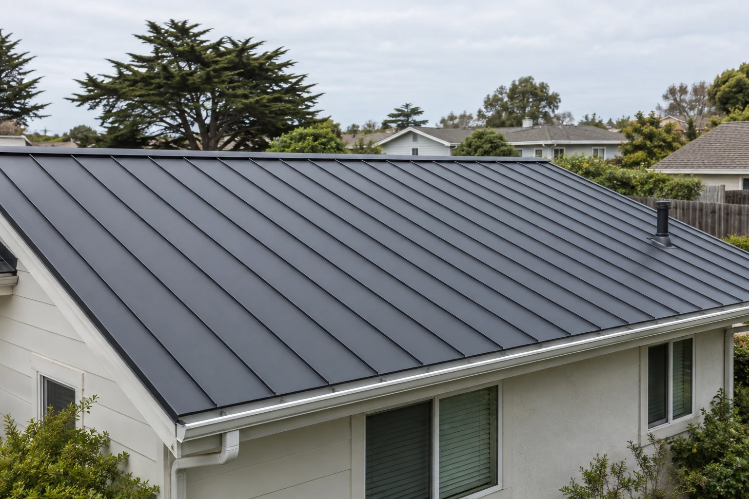 Standing seam metal roofing on a modest residence