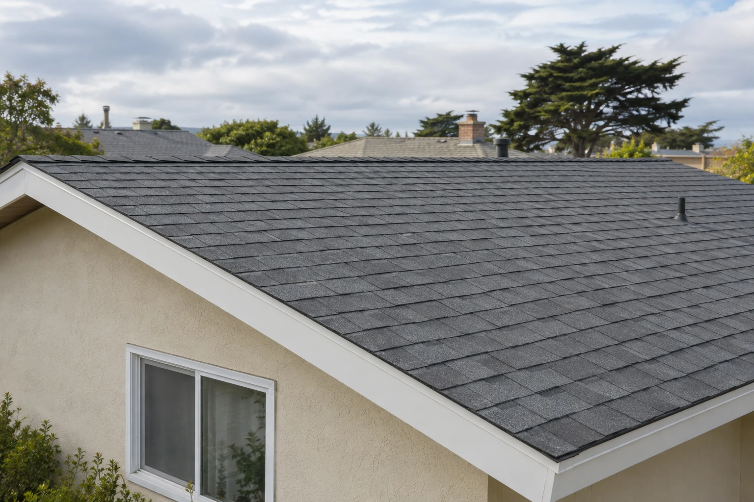 Close view of asphalt shingles on a residential roof